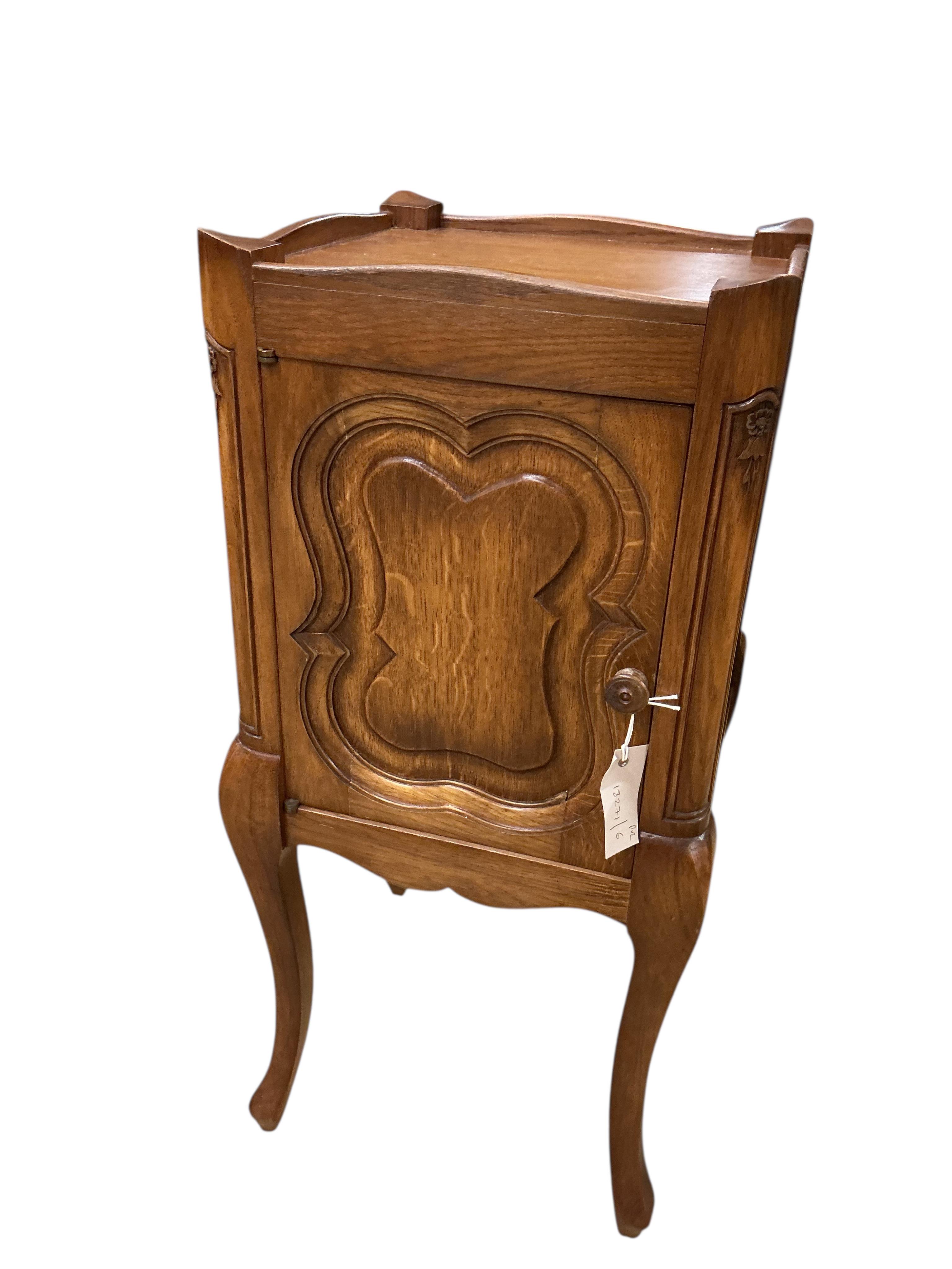 A pair of French oak bedside cabinets, width 34cm, depth 34cm, height 75cm